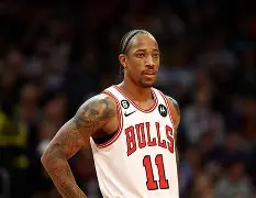 极速竞猜- 德罗巴和nba球员合影 